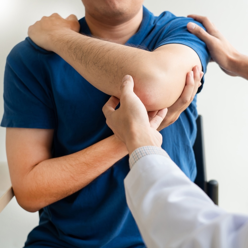 Physiotherapist working concept, Doctor and patient suffering or Chiropractor examining from shoulder pain in clinic medical office